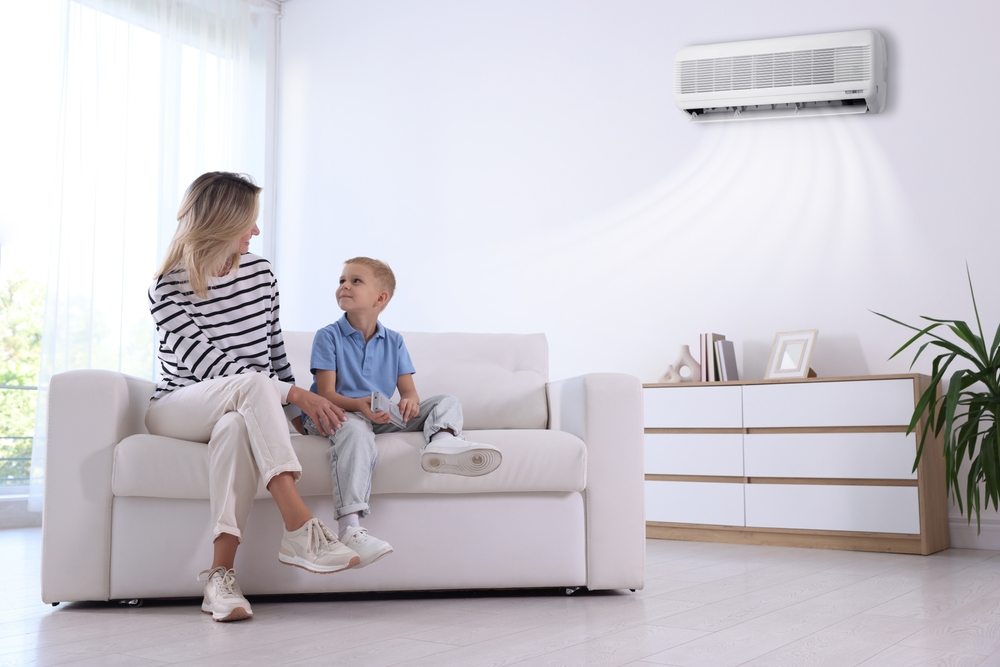 Mother,And,Son,In,Room,With,Air,Conditioner